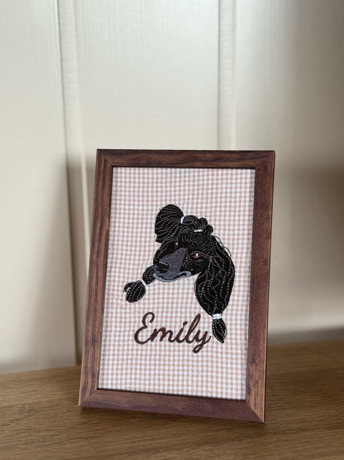 portrett i broderi